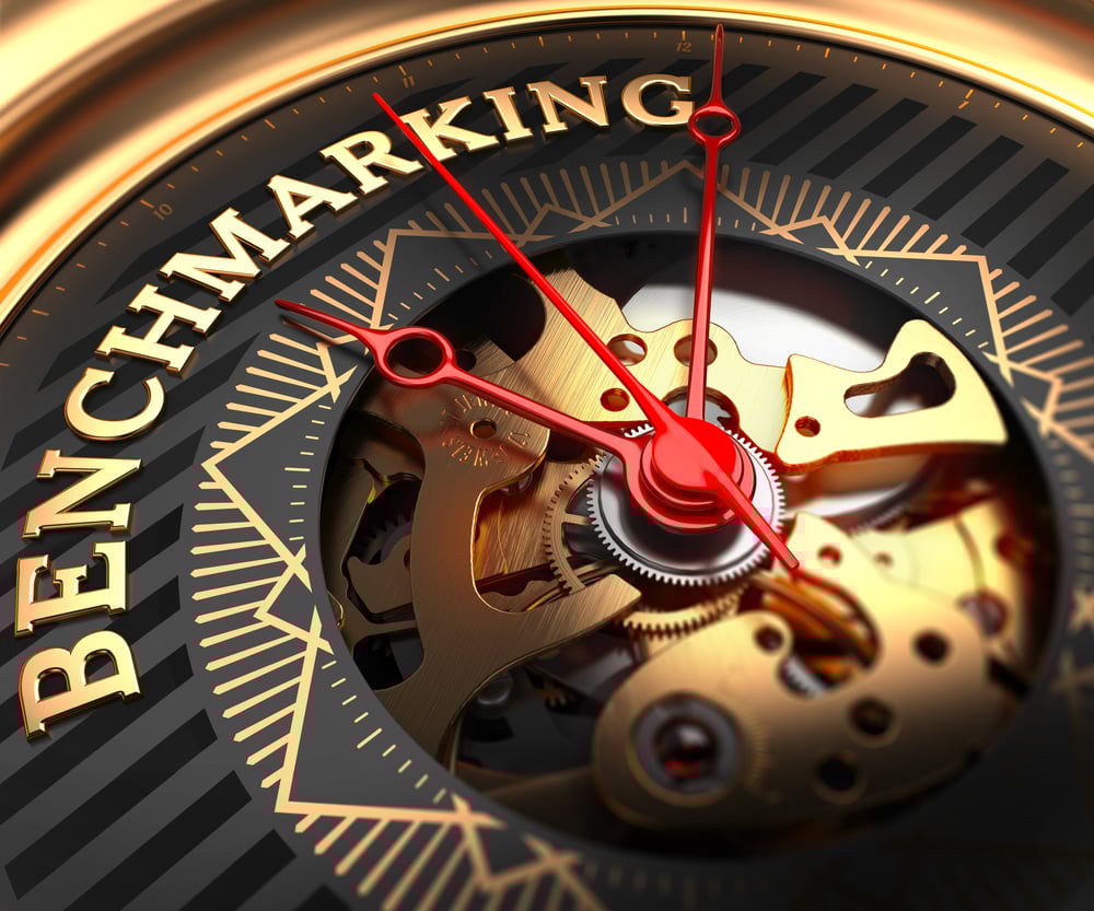 Benchmarking on Black-Golden Watch Face with Closeup View of Watch Mechanism.-1